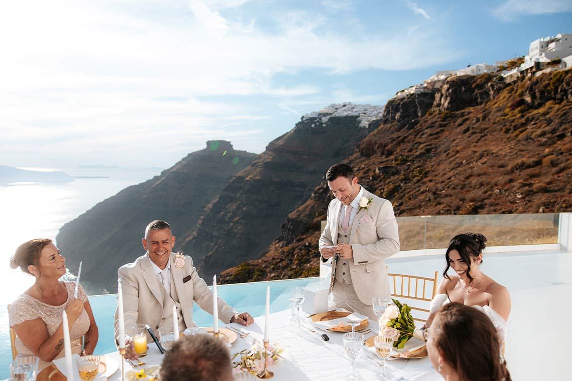 Proposal photographed at sunset in Oia, Santorini