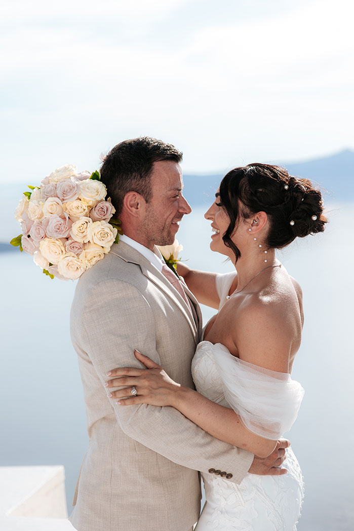 Proposal moment captured by a hidden photographer in Santorini